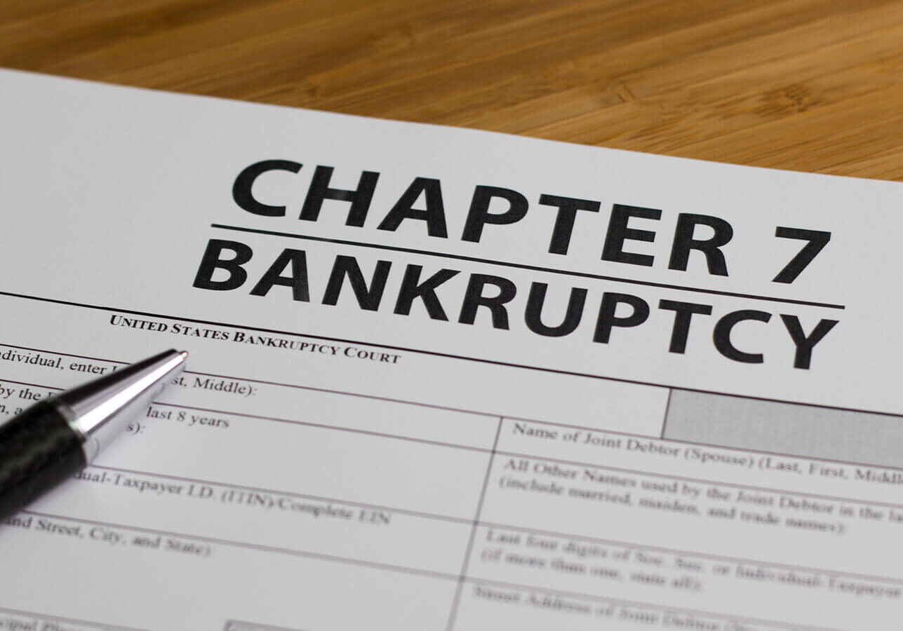 Chapter 7 bankruptcy form with pen